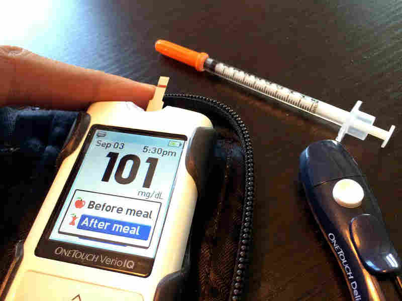 Nutritionist Cyrus Khambatta uses his glucose meter and lancets to check his blood sugar six to 10 times a day.
