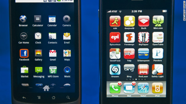 A Google Nexus One smartphone, left, beside Apple's iPhone. 